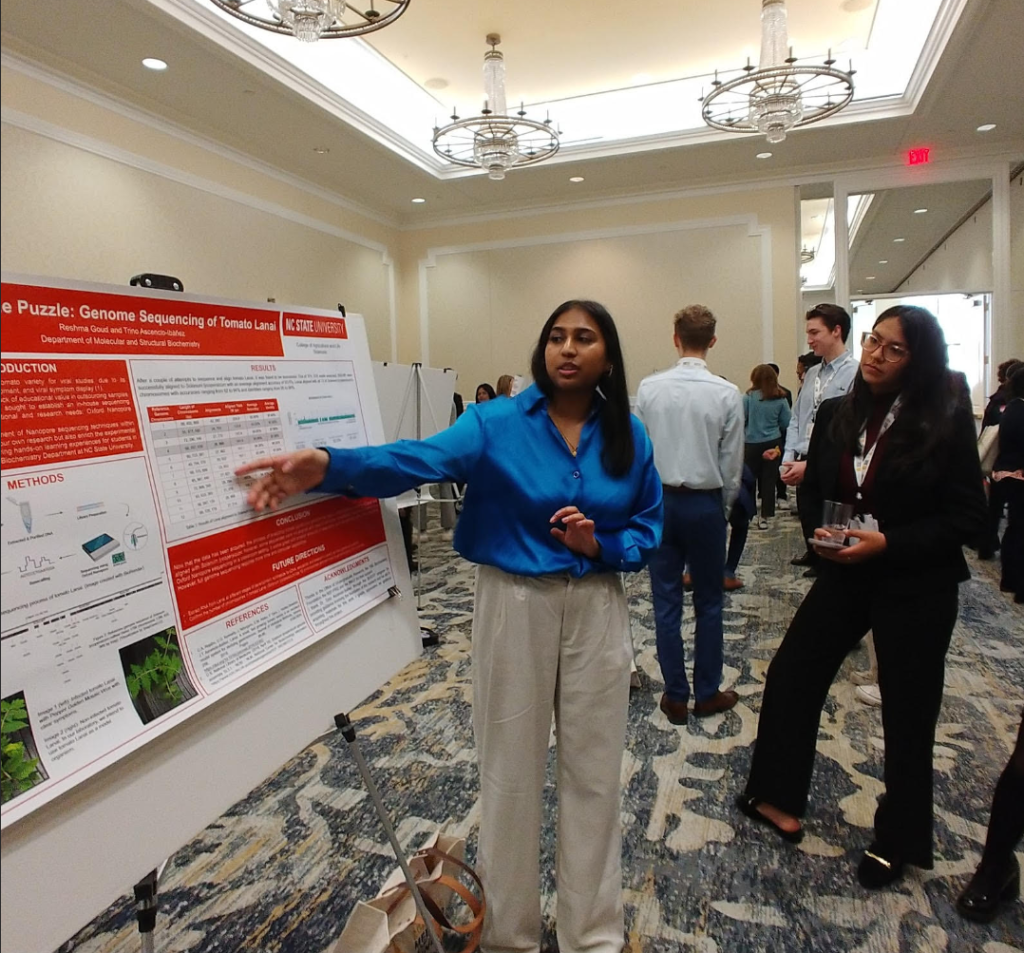 Student presenting her research in a symposium