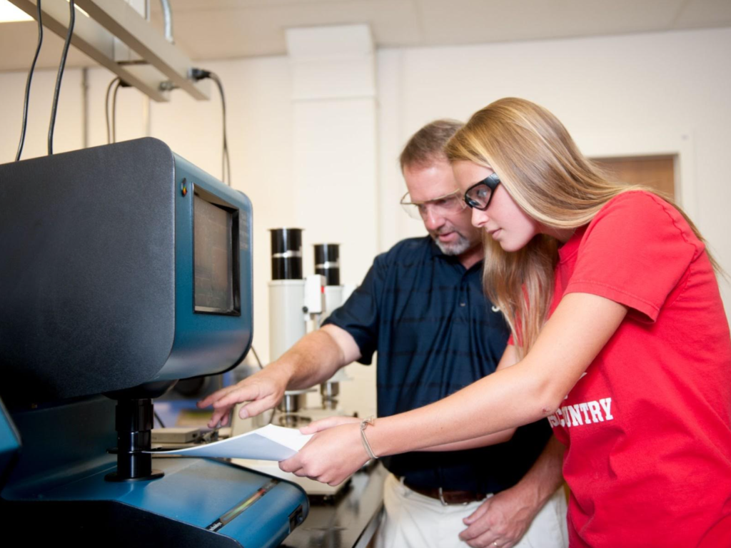 Student and Faculty in a lab