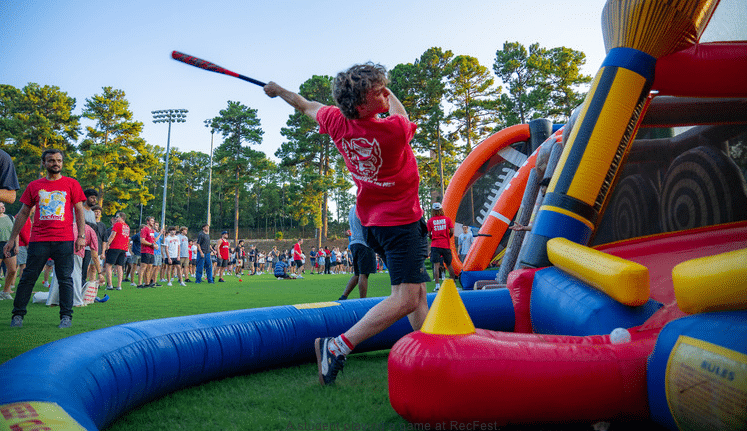 student playing with an inflatable game